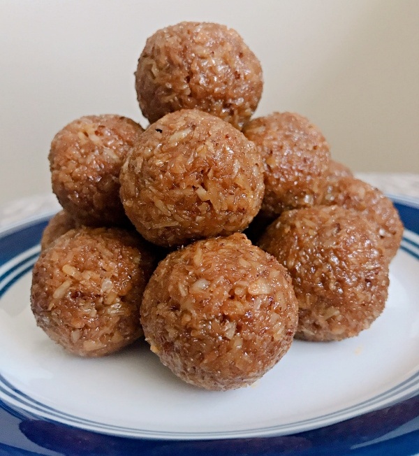 Coconut Ladoos Stacked on a plate